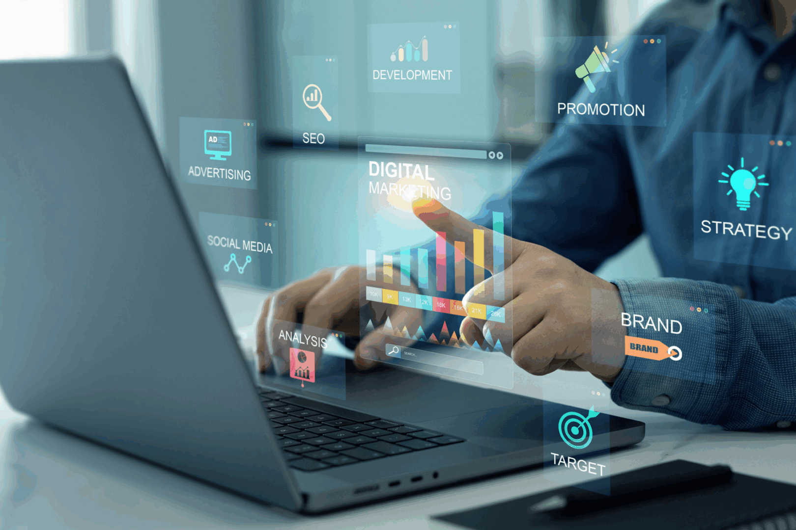 Hands using laptop for marketing analysis